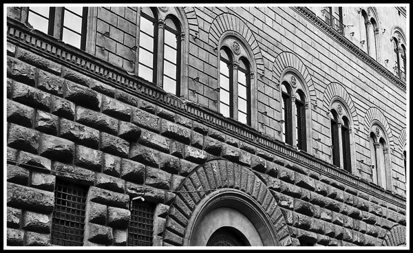 A black and white photo of the amazing brick work of the Palazzo Medici Riccardi 1