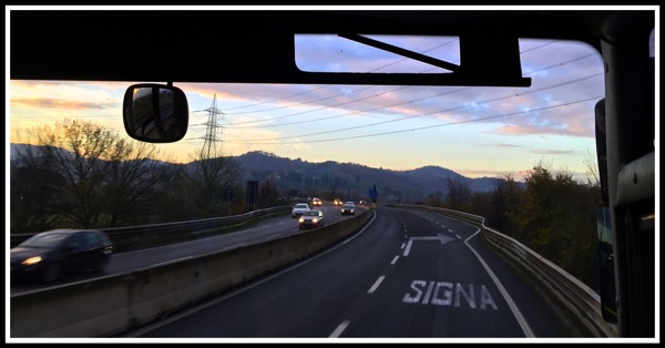 A photo of the beautiful hills taken from our seat on the bus from pisa to florence. Also Siena is written on the road.