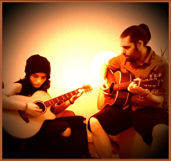 Me(on the right) playing guitar with my brother in law(on the left)